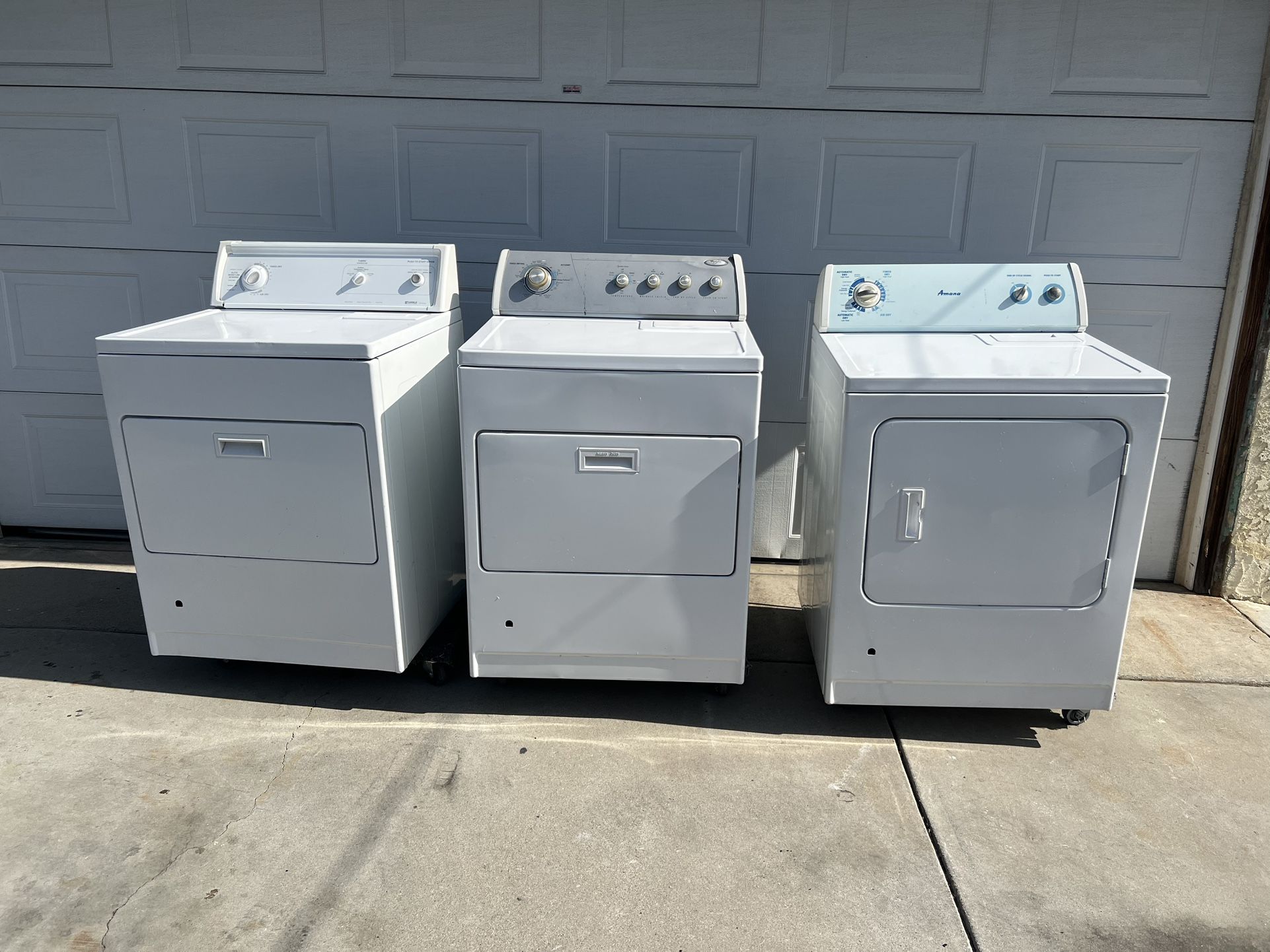 WHITE WHIRLPOOL (middle) GAS DRYER IN GOOD CONDITION