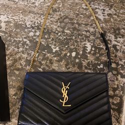 YSL BLACK and GOLD MONOGRAM CHAIN WALLET IN GRAIN DE POUDRE EMBOSSED  LEATHER. for Sale in Seattle, WA - OfferUp