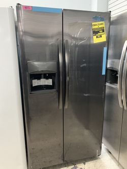 Frigidaire side by side in dark stainless new