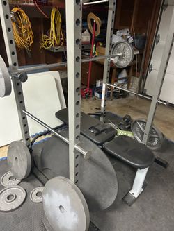Bench/Squat Rack with bar and weights