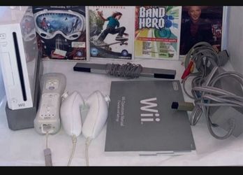 Nintendo Wii Bundle Lot System 1 controller and 2 nunchucks  8 Games In Good Condition  $80