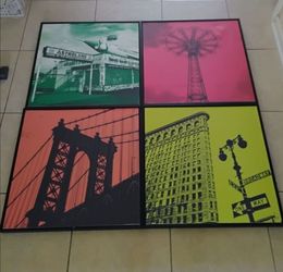 set of 4 pictures in black frames. Erin Clark "New York Nine". canvas