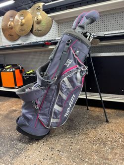 TOP FLITE XL STAND WITH SET OF CLUBS USED