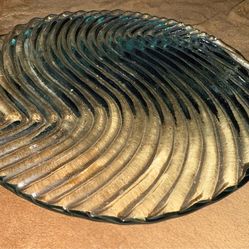 Heavy glass serving platter with cut in wave designs