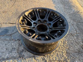 One 8 lug 17x8.5 inch hutchinson two piece rim Chevy, ford, dodge