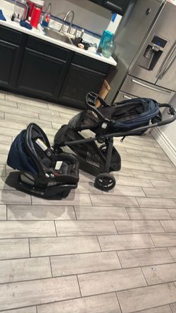 Navy blue and black Stroller car seat combo with car adapter