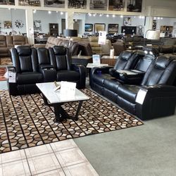 Caveman Den Power Reclining Sofa and Loveseat Set