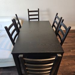 Rectangular wooden Table with 6 chairs. 