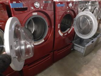 LG front load washer and electric dryer set with pedestal working perfectly with 4 months warranty