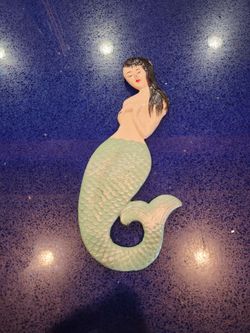 Cast iron mermaid bottle opener
