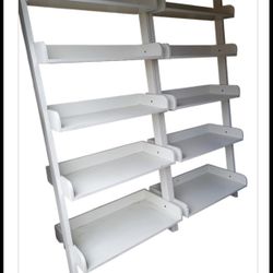 White wooden ladder display shelf or leaning bookcase