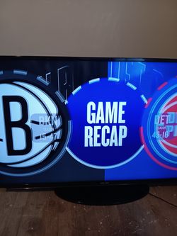 Samsung 50-inch flat screen TV with remote control