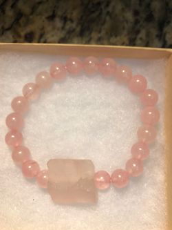 Rose quartz bracelet with raw rose quartz stone