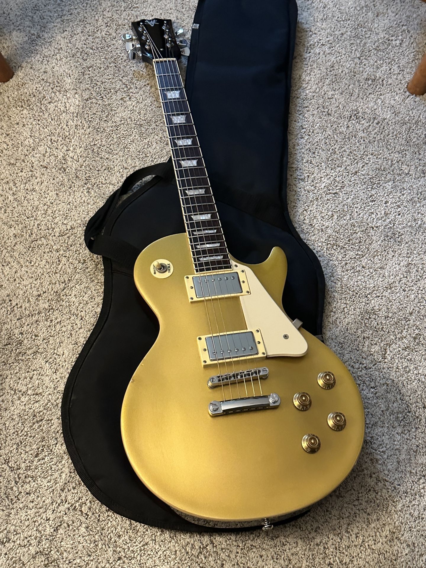 SVK Gold top Electric Guitar In The Les Paul Style With G & B Pickups