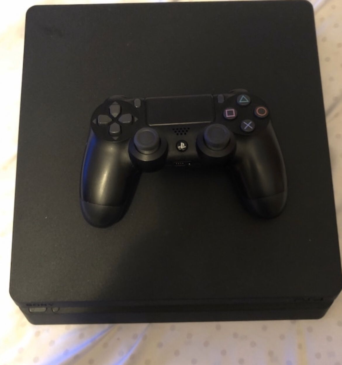 PS4 slim , comes with controller & cords