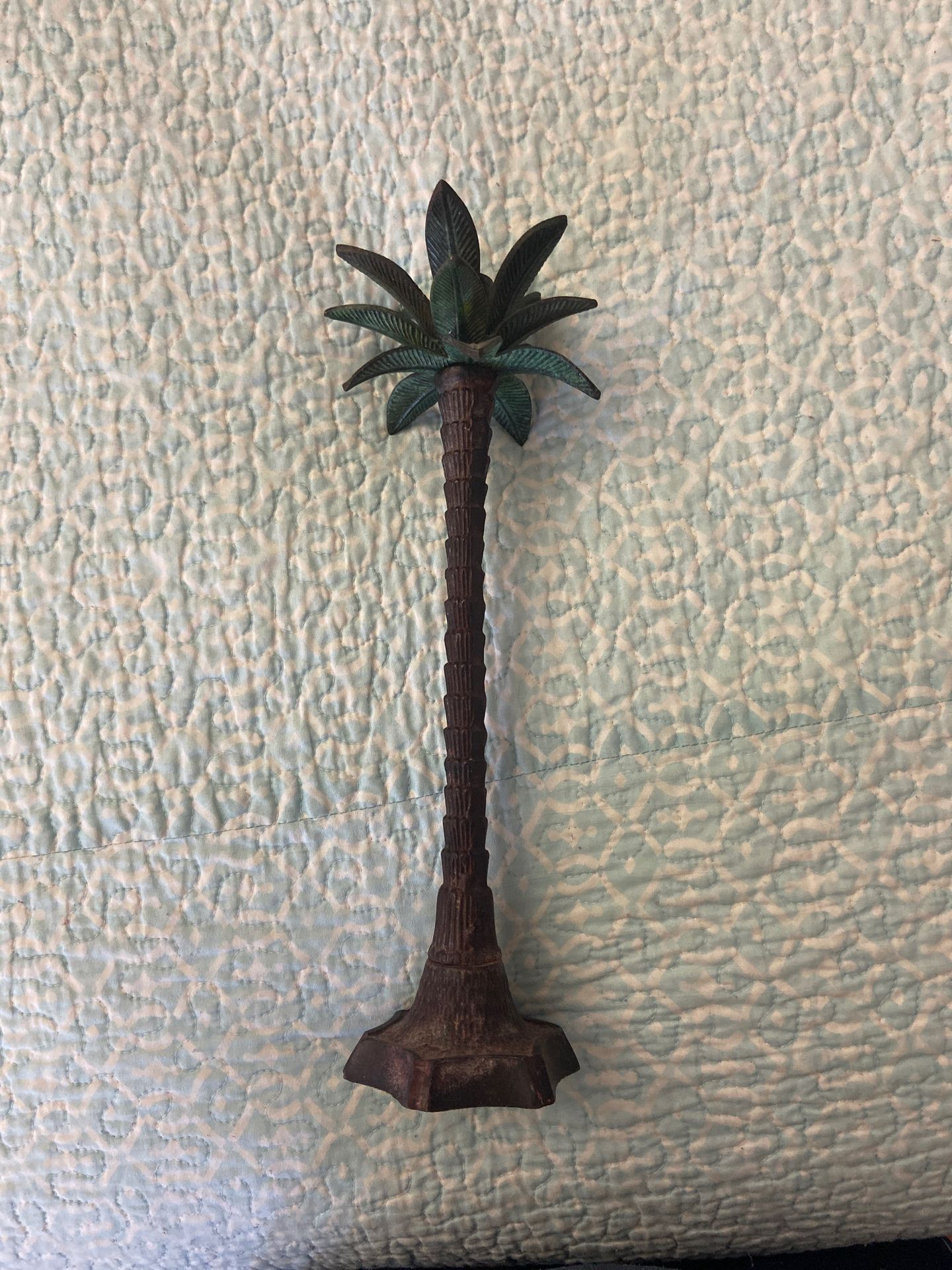 Steel palm tree candle holder