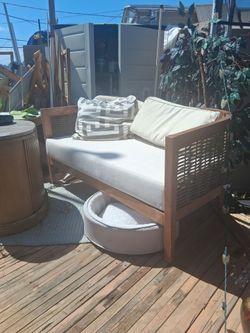 Wood Frame Loveseat with White Cushions
