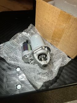 Automotive Starter Motor with Mounting Hardware