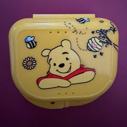 Pooh bear yellow retainer case