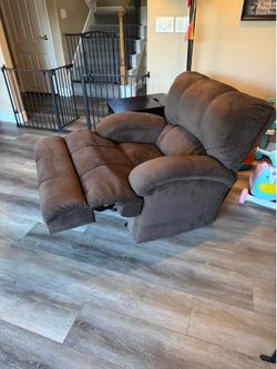 Brown fabric recliner/rocker