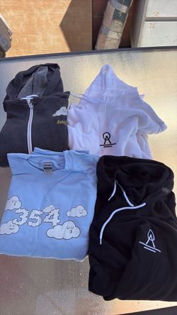 Bundle of 4 Graphic Hoodies and T-Shirt