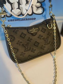 L.V. Monogram Handbag it’s actually $100