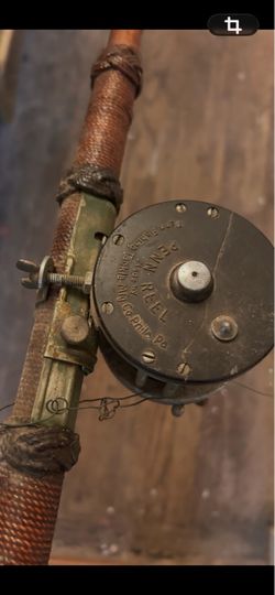 Vintage Penn Fishing Reel on Rod