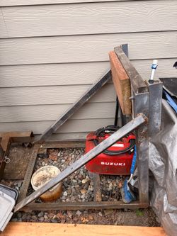 Outboard engine stand on wheels
