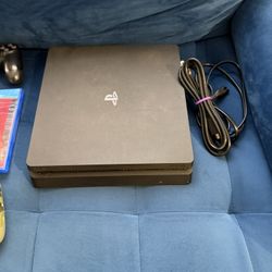 PS4 W/ 2 Controllers and 5 Games 