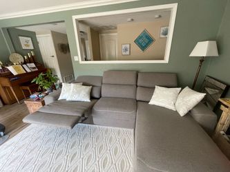 Sectional couch with electric reclining