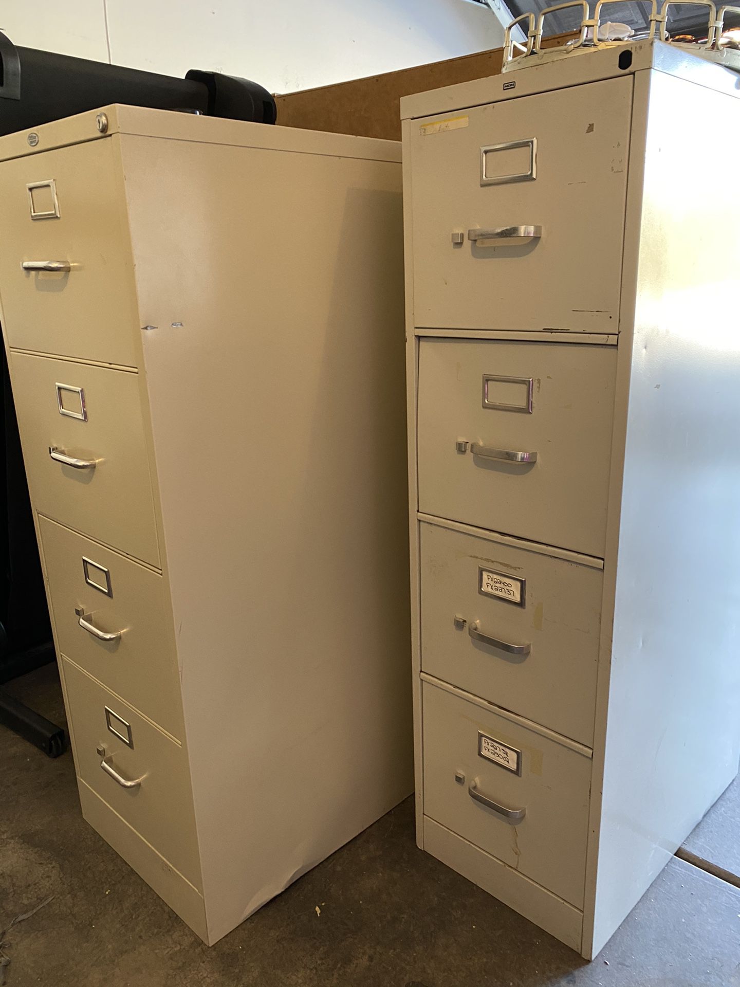 PENDING:2 four drawer file cabinets