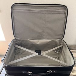Samsonite expandable soft sided luggage with handle that rolls………:)