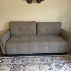 A two- and three-seater sofa in like new condition is for sale.