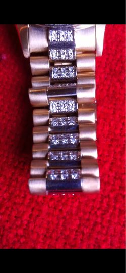 Gold Geneva watch (Rolex)