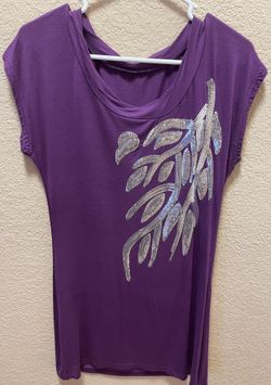 Purple Top With a Unique Silver Design