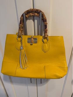 Italian bag with wooden handles.