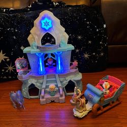 Fisher-Price Disney Frozen Little People - Elsa And Ana Lights and Music Toddler Playset, Elsa's Ice Palace.