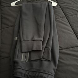 Nike tech pants