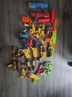 Nerf guns with bullets and accessories