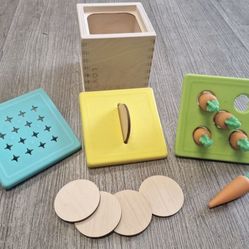 Lovevery Wooden Carrot Coin Drop Box Set Montessori Toy   Not missing any pieces. Comes with carrot posting set, coin bank set, and cotton swalo lid. 