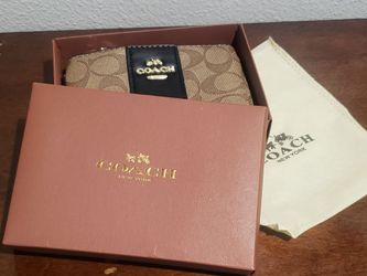 New! In Box. COACH Corner Zip Wristlet - Brown