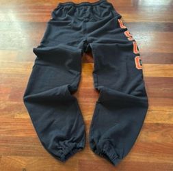 Black Sweatpants with Orange Lettering