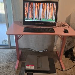 All in one computer, keyboard, mouse, gamer desk, and HP laser printer.