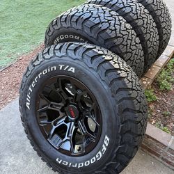 Like new trd Toyota Tacoma wheels and tires