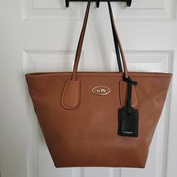 Coach Leather Taxi Zip Top Tote In Saddle Brown