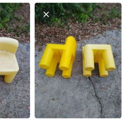 A Pair Of Kids Yellow Chairs