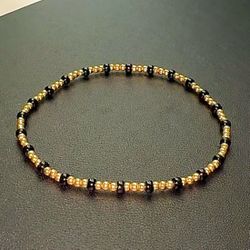 14k gold bead and onyx gemstone bracelet