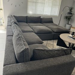 Albany Park Modular Sectional With 2 Ottomans