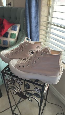 Women's size 8 Converse high top sneakers in blush pink.