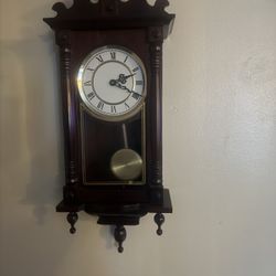 Clock Collection Classic 31" Chiming Wall Clock with Roman Numerals and a Swinging Pendulum